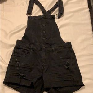 small black refuge overalls